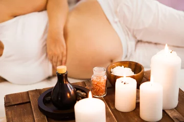 Young pregnant woman relaxing at Spa salon, Spa treatment © yatcenko