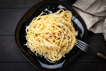 Spaghetti carbonara with egg and pancetta