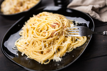 Spaghetti carbonara with egg and pancetta