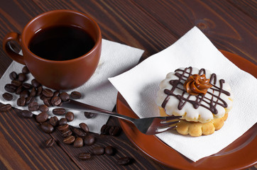 Coffee and small round cake