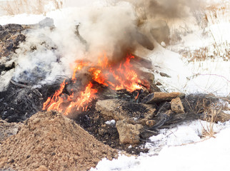 Winter, a lot of snow. The peat is burning underground. Next to residential buildings
