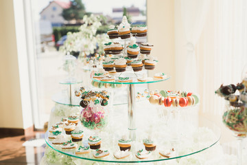 Different kinds of baked sweets on a buffet