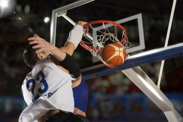 Fototapeta premium Two basketball players in action