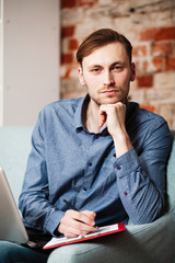 Young man with a laptop