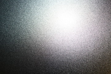 Silvery metal surface with glare