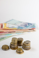 Money coins and banknotes from multiple countries