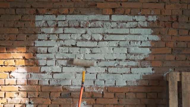 the red-brick walls, shaded white roller to paint. place for logo