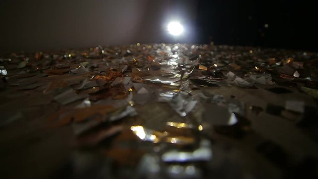 Confetti falls on the floor covered with confetti