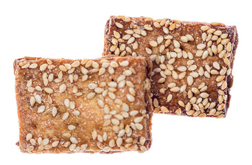 delicious biscuits with sesame seeds isolated on white background