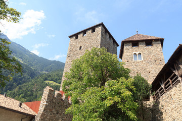 Fototapeta na wymiar Tyrol Castle interior courtyard and tower in Tirol, South Tyrol
