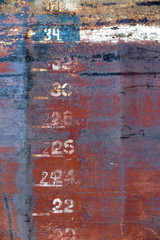 Old painted and rusted metal wall surface