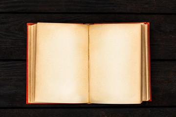 Naklejka premium Open book on dark background