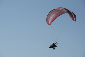 A paraglider in the sky