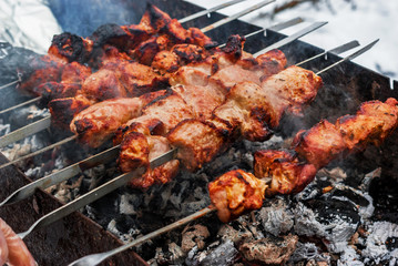 Barbecue cook on charcoal