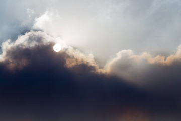 Naklejka na ściany i meble Industrial smoke closes the sun in the sky