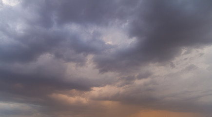 Obraz premium Heaven and hell, Autumn sky with dark colors and very gray clouds and rain-laden