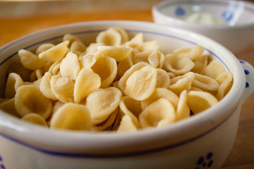 Typical Apulia region fresh pasta called orecchietta made of durum wheat semolina