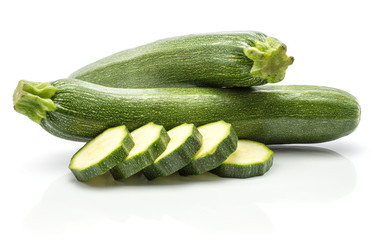 Two green zucchini with five slices stack isolated on white background raw courgette round pieces.