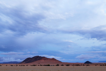 Obraz na płótnie Canvas Clouds over dry country