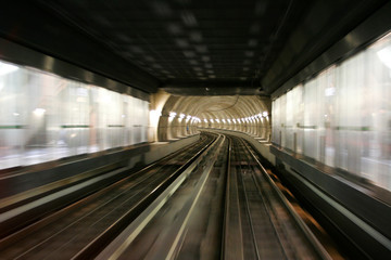 Fototapeta na wymiar Moving fast in a subway train