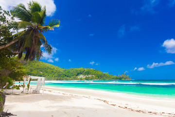 vacation at perfect tropical white sand beach. Mahe, Seychelles
