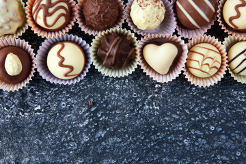 a lot of variety chocolate pralines, belgian confectionery gourmet chocolate.