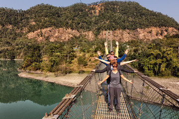 Group of Tourists on a Suspension Bridge, Nepal