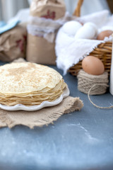Thin sweet pancakes. traditional Russian food in the spring. Festive treat. Homemade breakfast. Free space for text or a postcard.