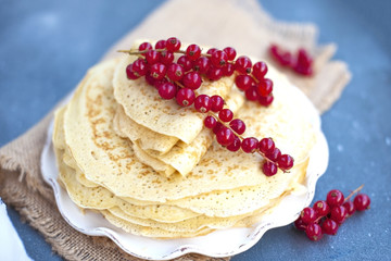Thin sweet pancakes. traditional Russian food in the spring. Festive treat. Homemade breakfast. Free space for text or a postcard.