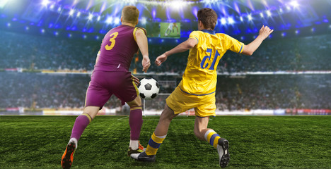 Obraz na płótnie Canvas Soccer ball on the field of stadium