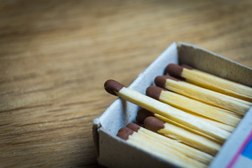 The open boxes of matches are photographed close-up.