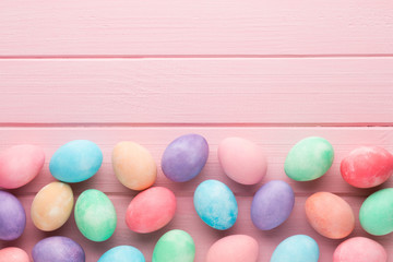 Pastel Easter eggs background. Spring greating card.