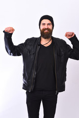Naklejka premium Street life style concept. Rock fan or gangster stretches muscles