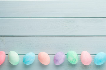 Pastel Easter eggs background. Spring greating card.