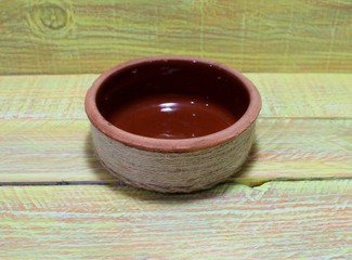 Artificial cactus from stones in a ceramic pot, handmade