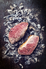 Barbecue caveman wagyu roast beef as top view on charcoal