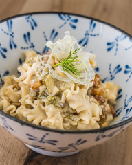 Pasta with fresh herbs, pine nuts and currants