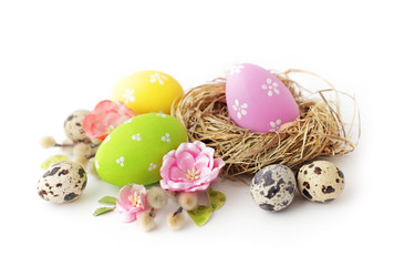 easter eggs and flowers isolated on white background