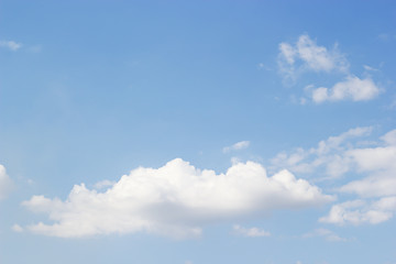 Naklejka na ściany i meble Blue sky background and white clouds soft focus, and empty space