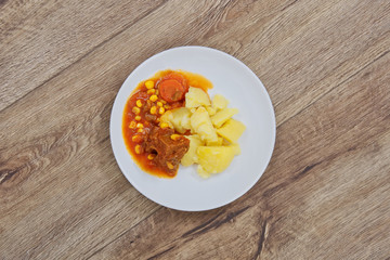 Mexican goulash with potatoes on a table