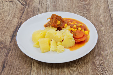 Mexican goulash with potatoes on a table