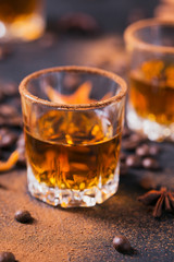 Whiskey, brandy or liquor, spices, anise stars, coffee beans, cinnamon sticks