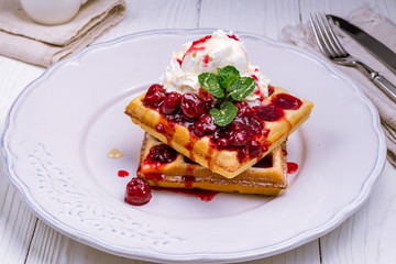 Waffle with cherry jam