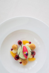 Elegant dessert in the plate, molecular gastronomy, haute couture dessert