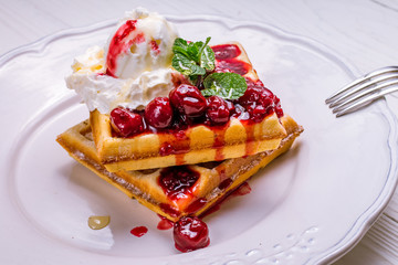 Waffle with cherry jam