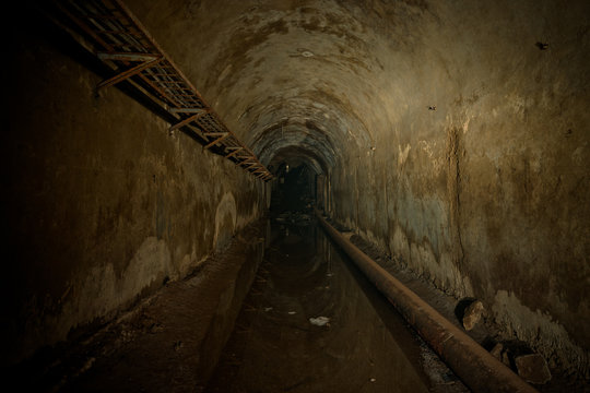 Underground sewer tunnel under Sevastopol, Crimea. Flooded sewerage drainage tunnel 