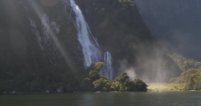 New Zealand Milford Sound Waterfall in the glinting sun