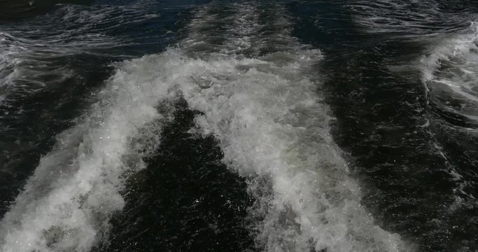 Boat wake, white water trail