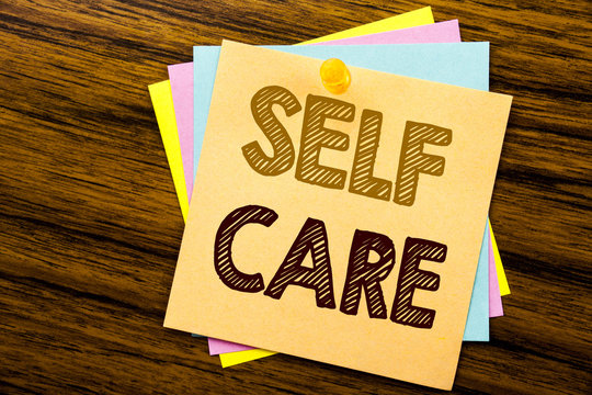 Conceptual hand writing text caption inspiration showing Self Care. Business concept for Taking caring for own Health written on sticky note paper on wooden background.