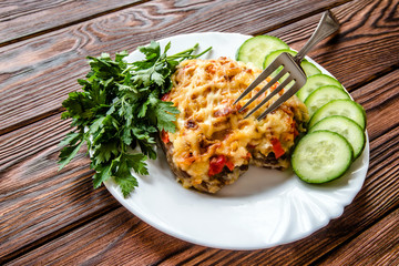 Pork chop with cheese and red pepper 
